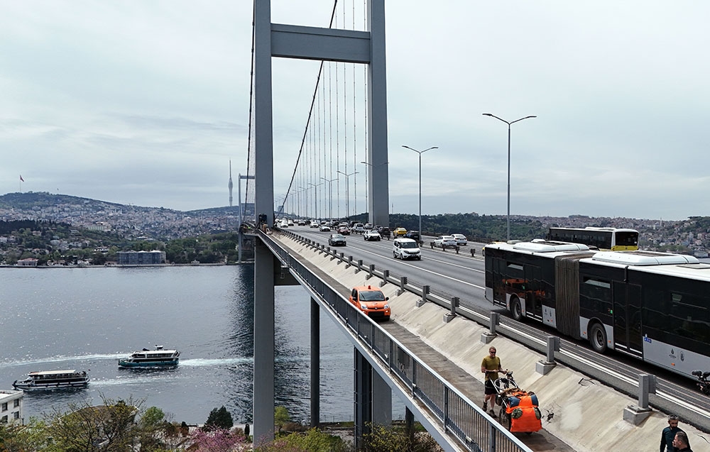 Historic moment in intercontinental march: Karl Bushby walks across July 15 Martyrs' Bridge