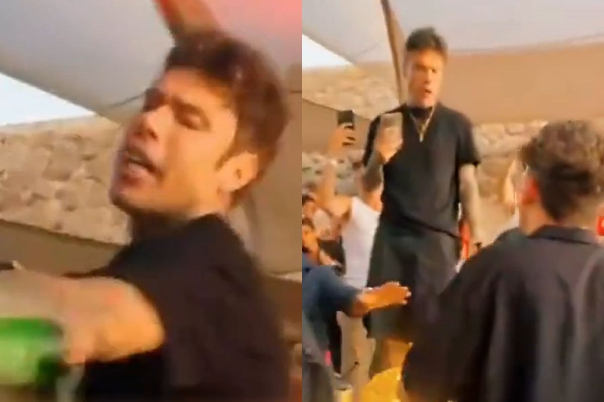 Fedez schopt een fan die hem filmt met zijn mobiele telefoon in een nachtclub: de video veroorzaakt woede op sociale media.