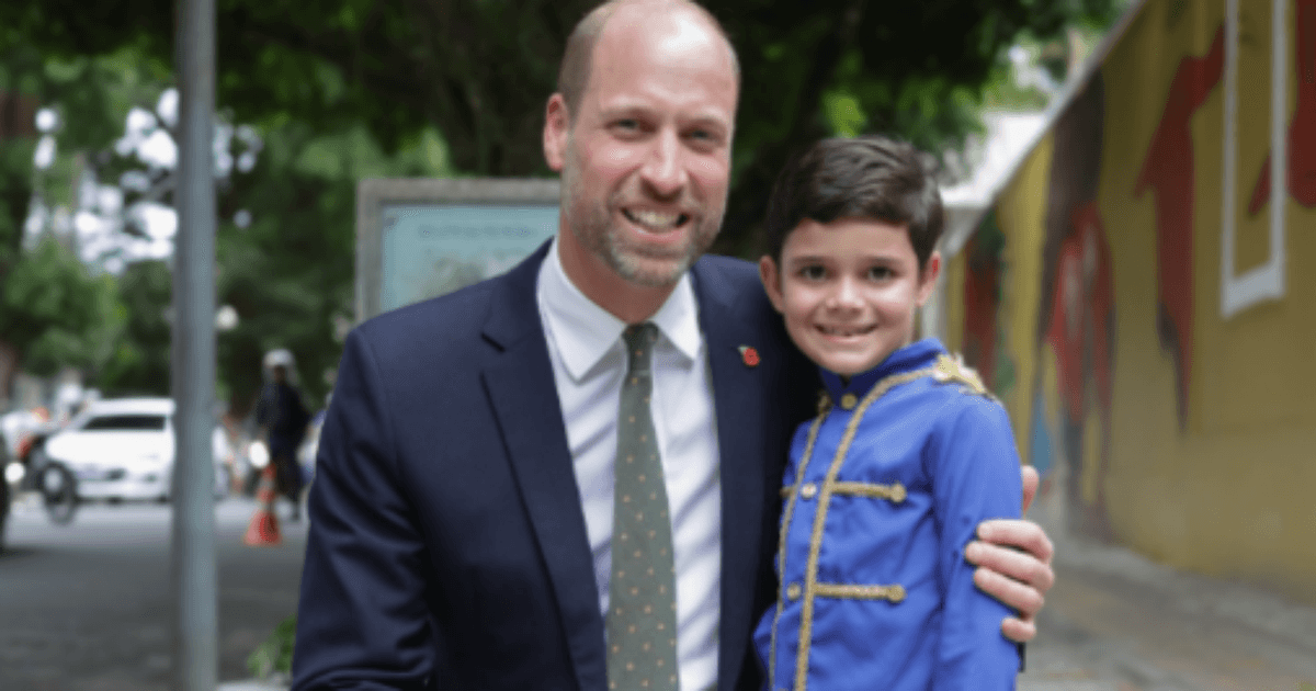 William receives a letter from a boy dressed as a prince during a visit to a museum in Bethlehem.